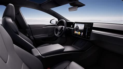 The Tesla Yoke can now be swapped with a traditional steering wheel ...