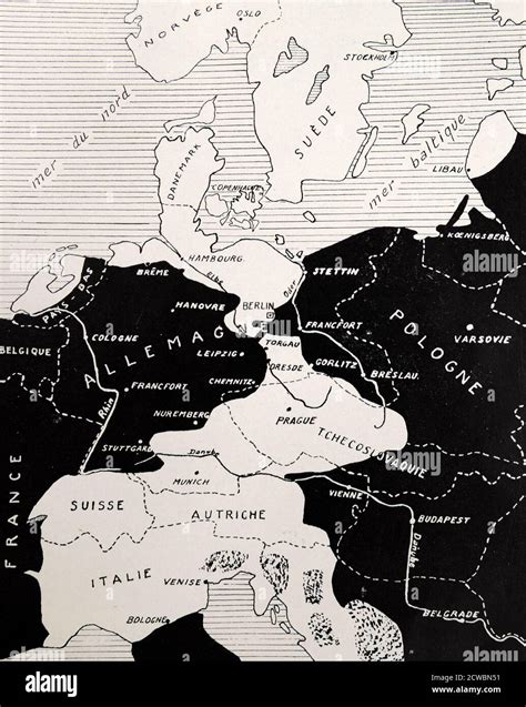 Black and white photograph of World War II (1939-1945) showing a map of ...