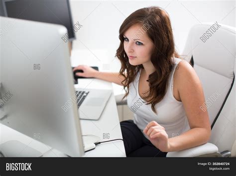 Young Woman Working On Image & Photo (Free Trial) | Bigstock