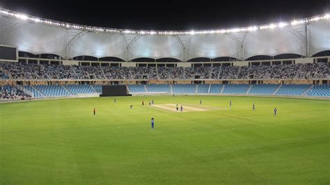 Play gets underway at the Dubai International Cricket Stadium ...