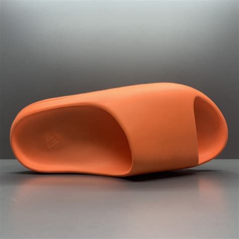 Yeezy Slides 'Enflame Orange' - SneakerCool.com