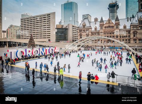 toronto nathan phillips square winter people skating Stock Photo - Alamy