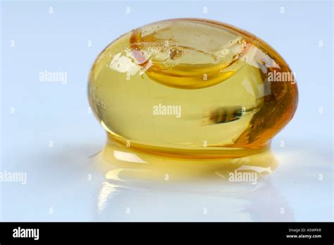 Salmon oil tablet Stock Photo - Alamy