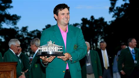 2018 Masters champion Patrick Reed poses with the Masters Tournament ...