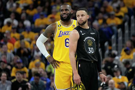 LeBron follows Steph Curry back to Warriors bench in weird moment