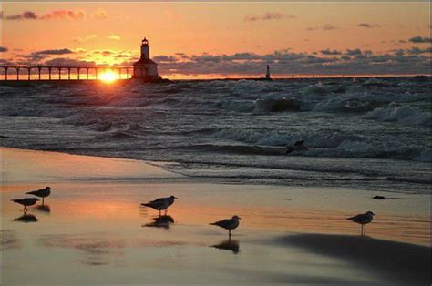 Sunset at Michigan City, Indiana beach and lighthouse Michigan City ...