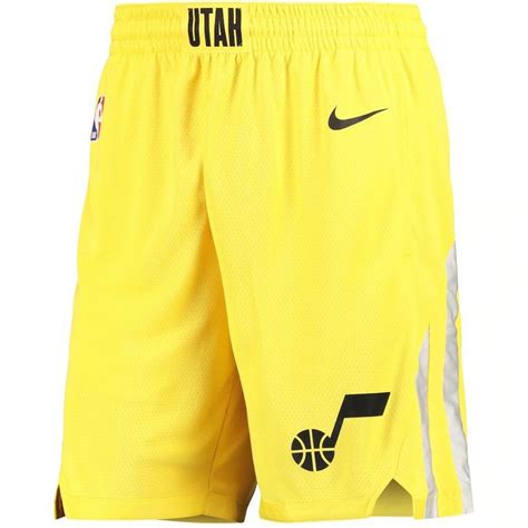 the nike utah basketball shorts are yellow and black