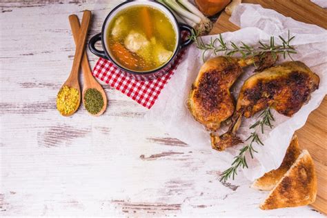 Delicious Roasted Chicken Legs and Soup Stock Image - Image of ...