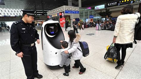 Pictures: Robot Takes Over Patrolling At Chinese Railway Station ...