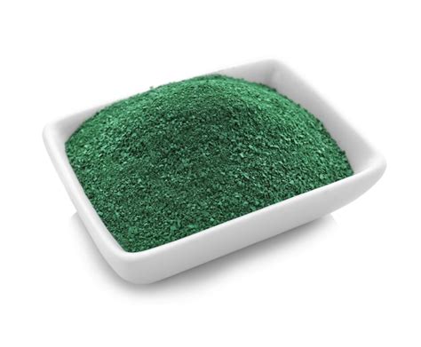 Premium Photo | Bowl with spirulina algae powder on white background