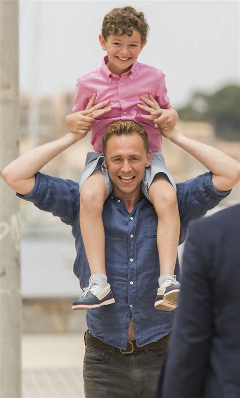 Tom Hiddleston Andrew Birch with Roper's son on the night mgr Via Twitter. | Tom hiddleston, Tom ...