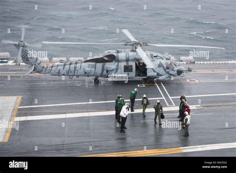 PACIFIC OCEAN (Jan. 20, 2017) Rear Adm. Jay Bynum, commander of Carrier ...