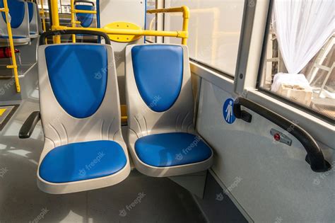 Premium Photo | New comfortable seats inside a modern public bus seats on the bus for the ...