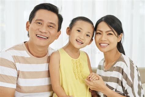 Cheerful Vietnamese family stock photo. Image of smiling - 144243240