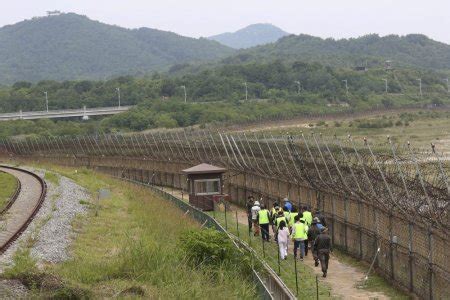 North Korean gymnast jumps border fence to freedom in South Korea ...