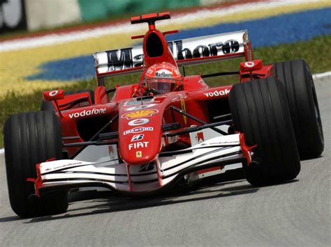 Michael Schumacher (Ferrari 248 F1) 2006 Sepang #F1 (P6, with the cars ...