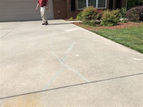 Concrete Repair - Stabilizing and Sealing Cracks in Concrete Driveway ...