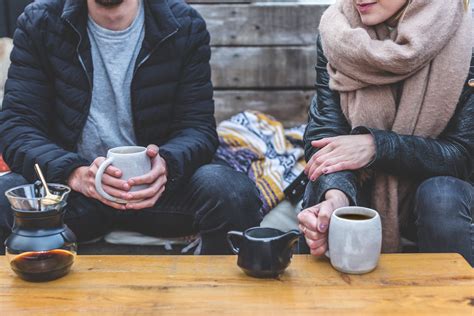 Two Person in Front of Coffee Table · Free Stock Photo