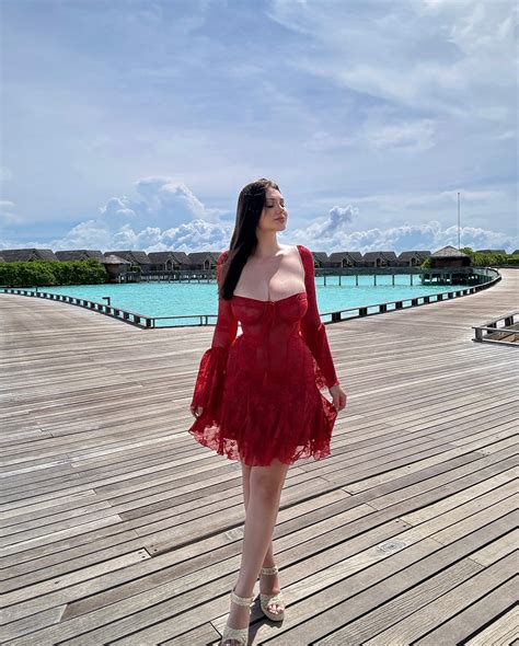 Andreea Mares Turns Heads in a Stylish Red Dress While Strolling in the Maldives ...