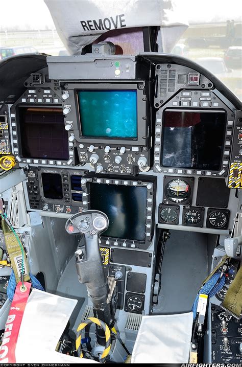 the cockpit of an airplane with multiple monitors