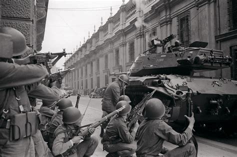 Troops led by General Augusto Pinochet siege La Moneda Palace, where ...