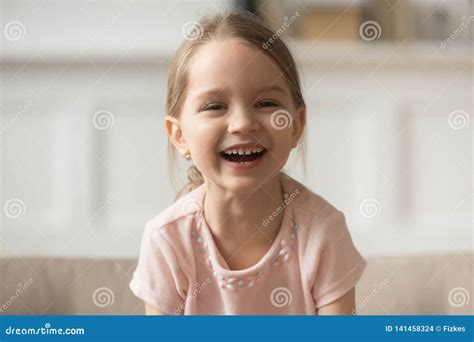 Funny Adorable Little Girl Laughing Looking at Camera, Headshot ...