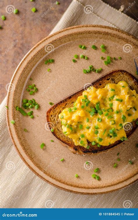 Scrambled eggs with herbs stock image. Image of brown - 101884545