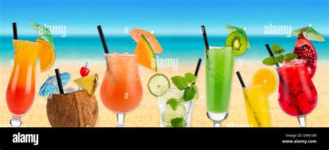 Cocktails in front of beach and sea Stock Photo - Alamy