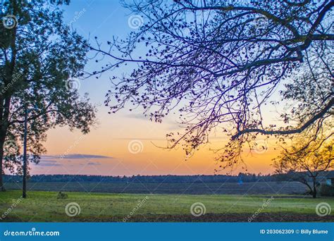 A Beautiful Sunset on Country Farm Land Stock Image - Image of meadow, sunset: 203062309