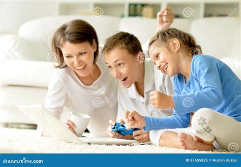 Family Playing Computer Games Stock Image - Image of playing, program: 87655825