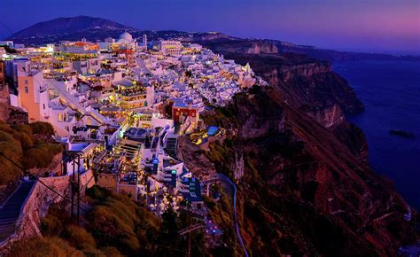 Sunset on Fira, Santorini, Greece Photograph by Jeff Black