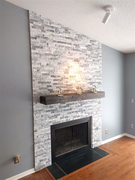 i built a stacked stone fireplace surround | Diy stone fireplace surround, Diy stone fireplace ...