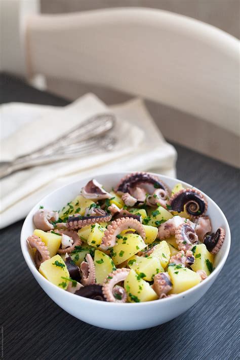 "Octopus Salad" by Stocksy Contributor "Davide Illini" - Stocksy