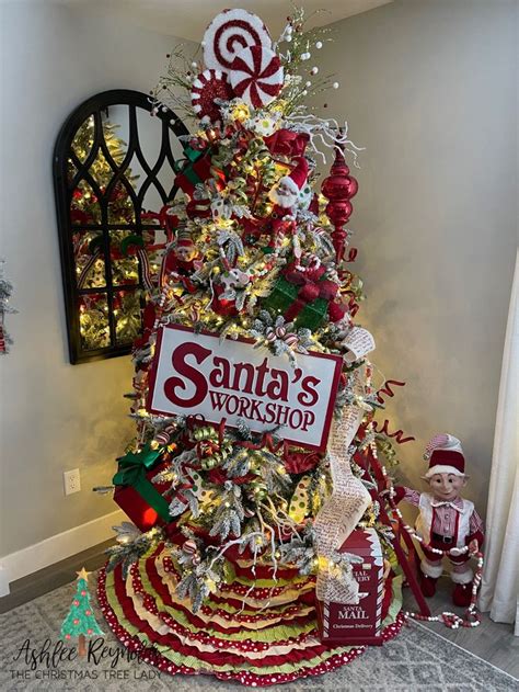 Santa’s workshop Christmas tree | Christmas decorations, Christmas tree ...