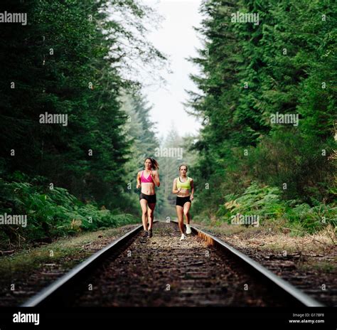 Teenage girl running on track hi-res stock photography and images - Alamy