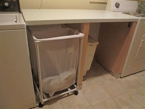 Laundry folding station out of a dishwasher cabinet - IKEA Hackers - IKEA Hackers