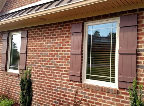 Four Board Vinyl Shutters on Brick Home | Architectural Depot