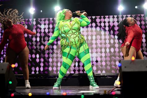 Lizzo Became the Grinch With Green Hair, a Striped Bodysuit, and a Corset — See the Photos ...