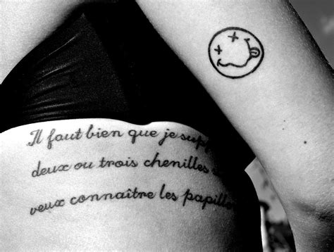 Meaning Nirvana Smiley Tattoo