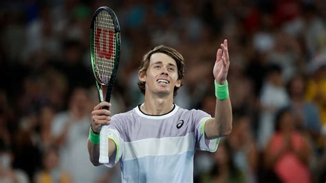 Alex de Minaur sprints to first-up Australian Open win as weather ...