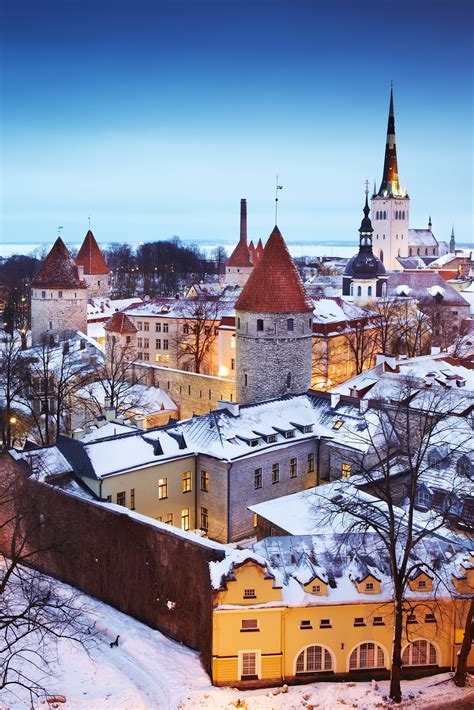 The medieval old town of Tallinn, Estonia, looking beautiful under a sprinkling of snow, as ...