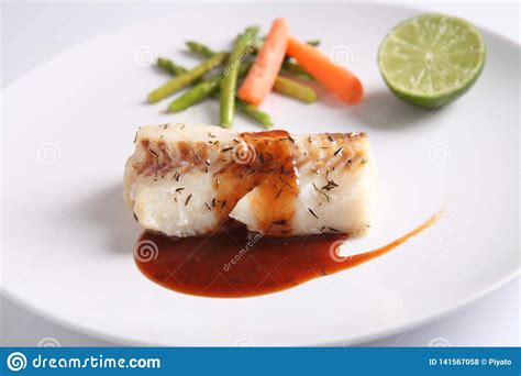 Grilled cod fish steak stock photo. Image of prepared - 141567058