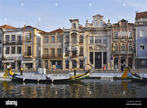 Traditional architecture beside the Central Canal in Aveiro Portugal Stock Photo - Alamy