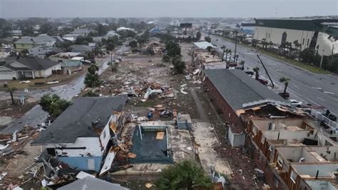 Florida tornadoes: Beachfront home left tilting to the side, supported ...