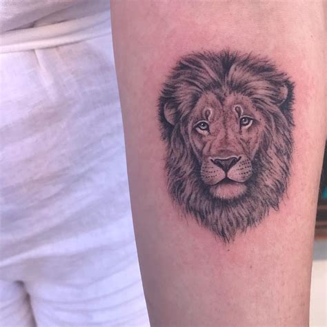 Lion tattoo on upper forearm. Done by Paul at Unique Tattoos in Perth ...