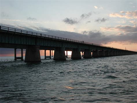 Sunset at the Seven Mile Bridge Photograph by Nancy Taylor | Fine Art ...