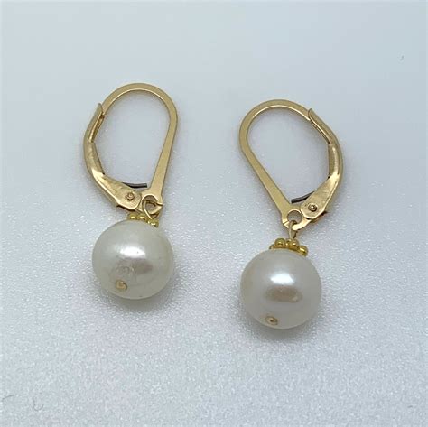 freshwater pearl drop clasp earrings.