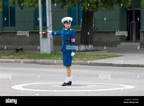 Traffic policewoman at work, North Korean police woman in the street ...