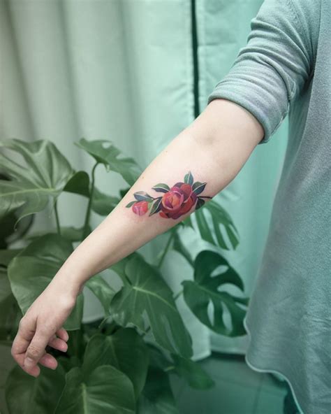 Camellia flower tattoo by Mavka Leesova - Tattoogrid.net