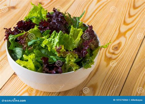 Salad Leaves, Purple Lettuce, Spinach, Arugula. Mixed Fresh Salad in a White Bowl Stock Photo ...